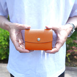 三つ折りコンパクトウォレット(オレンジ×エトープ)