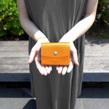 三つ折りコンパクトウォレット(オレンジ×エトープ)